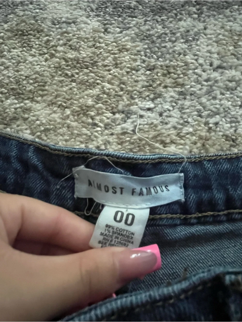 blue denim distressed shorts